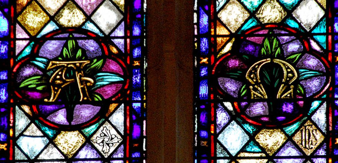 Sanctuary brief history - alpha_omega staine glass