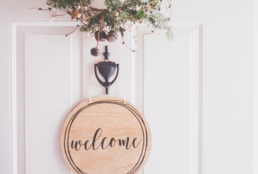 Welcome sign on door